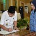 Bupati Sarolangun Cek Endra Serahkan SK Dan Pimpin Sumpah Janji PNS