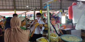 Dampak Covid-19, DPW PGK Berikan Bantuan di Pasar Angso Duo