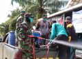 Cegah Penyebaran covid-19 Dewan Muarojambi Lakukan Penyemprotan Disinfektan di Kumpeh Ulu