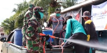 Cegah Penyebaran covid-19 Dewan Muarojambi Lakukan Penyemprotan Disinfektan di Kumpeh Ulu