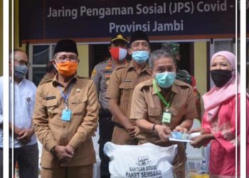 Bupati Syahirsah Dampingi Gubernur Jambi Menyerahkan Bantuan  Covid-19