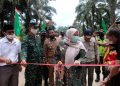 Bupati Masnah Resmikan Pembangunan Akses Jalan Desa Mulya Unit XII Bahar Utara