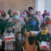 Masnah Busro Bagikan Sembako Untuk Janda dan Anak Yatim di Mendalo Laut