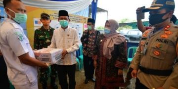 Masnah Busro Kunjungi Poskotis Idul Fitri 2020