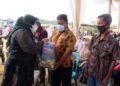 Bupati Masnah Busyro Salurkan Bantuan Sembako kepada Masyarakat Terkena Dampak Covid-19