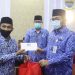 Sekda Beri Bingkisan Idul Fitri dan Santunan Uang Duka Anggota Korpri
