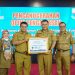 Pemkab Muaro Jambi Terima Penghargaan Predikat Kepatuhan Standar Pelayanan Publik Tahun 2022