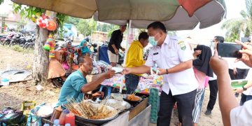 Pemkab Muaro Jambi Gelar Berian Masker Geratis Guna Mencegah ISPA